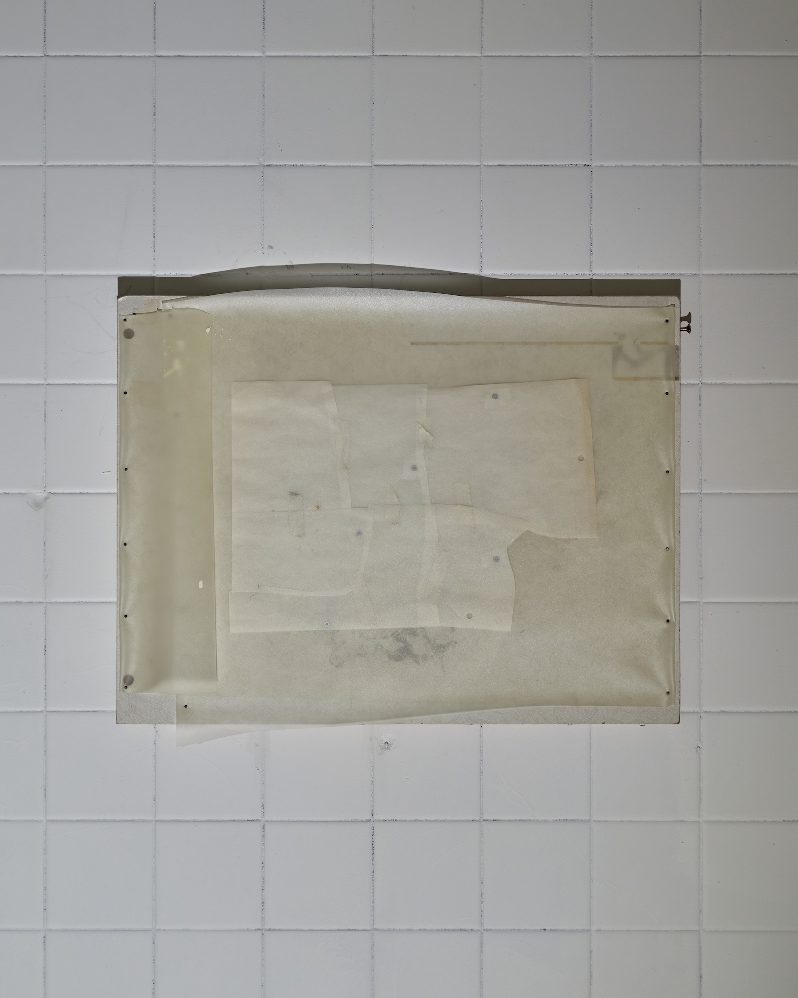 Min Hyein, Surgery, 2024, aged paper, masking tape, metal washer, artist frame, 56x42.5x2cm