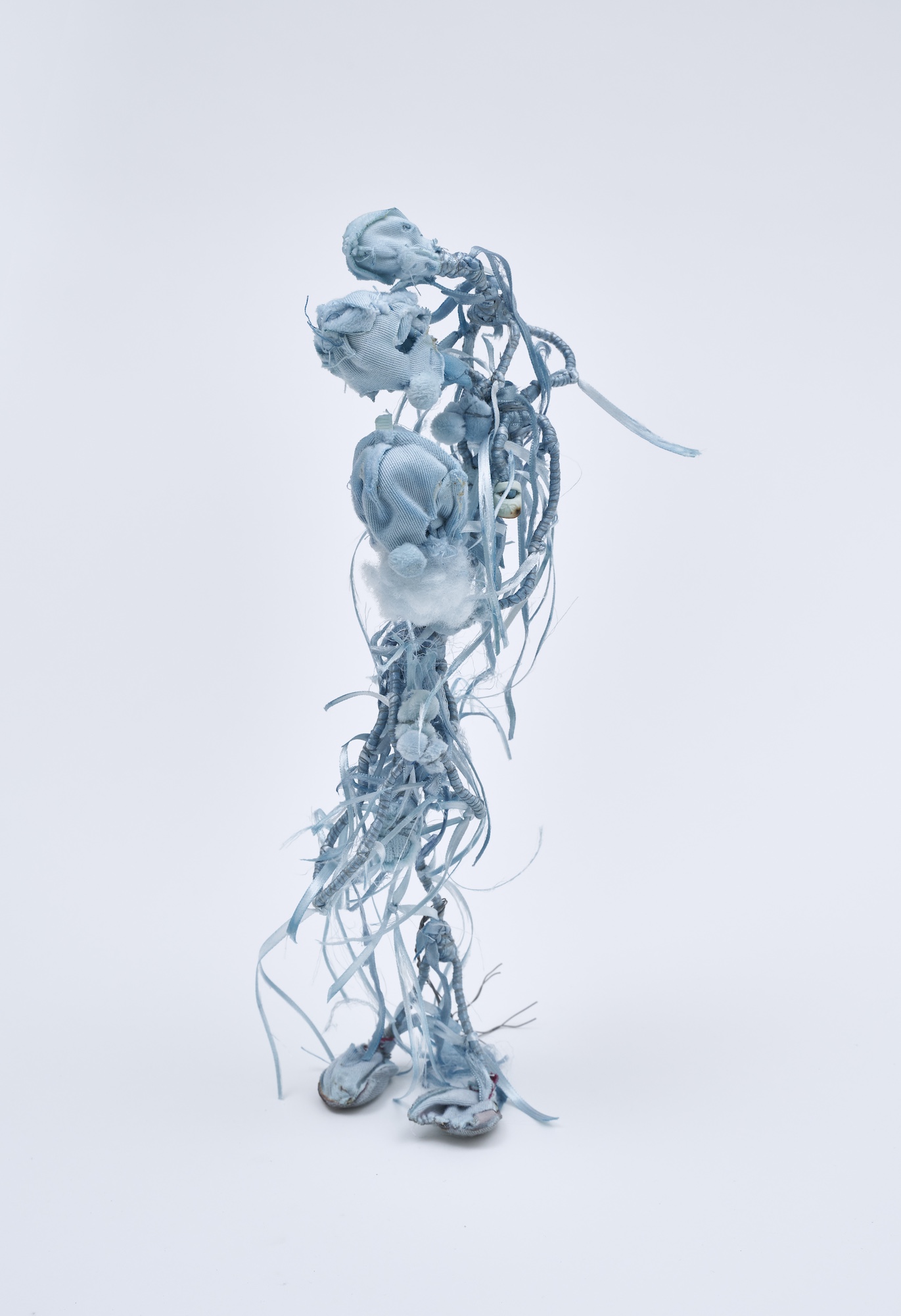 Flower 24, 2026, Wire, cord, thread, pigment, fabric, found objects, dolls, miniatures, 12x39x7cm